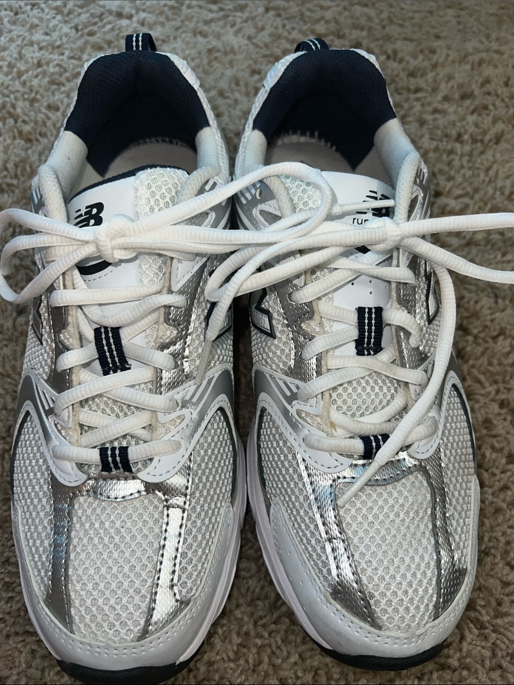 New Balance 530 White and Silver size 8.5 D Women's or Men's 7D.